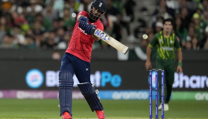 England's Moeen Ali hits a four during the final of the T20 World Cup cricket at the Melbourne Cricket Ground between England and Pakistan in Melbourne, Australia, Sunday, Nov. 13, 2022. (AP Photo/Mark Baker)