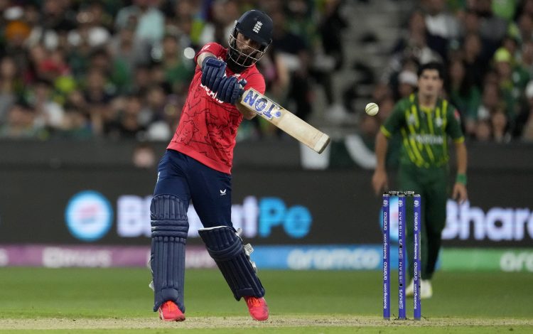 England's Moeen Ali hits a four during the final of the T20 World Cup cricket at the Melbourne Cricket Ground between England and Pakistan in Melbourne, Australia, Sunday, Nov. 13, 2022. (AP Photo/Mark Baker)
